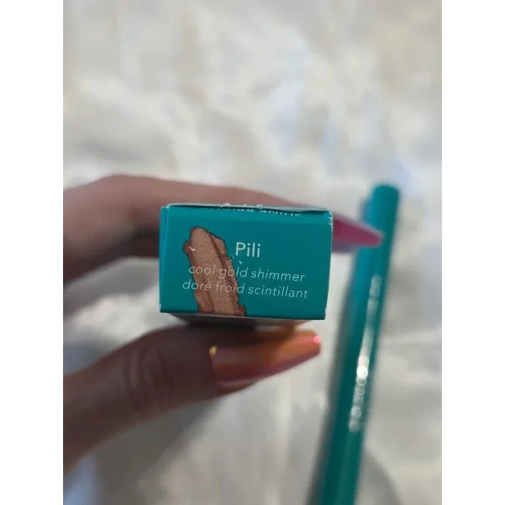 Thrive Brilliant Eye Brightener Stick - Pili (cool gold shimmer)